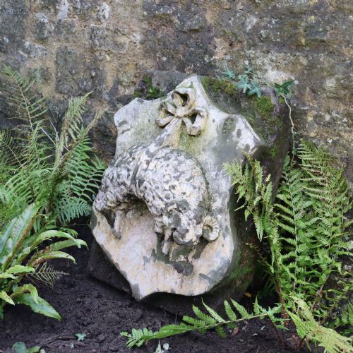 LARGE 19TH CENTURY POSSIBLY EARLIER SANDSTONE WALL PLAQUE DEPICTING A SHEEP SUSPENDED IN A RIBBON - ADDITIONAL PHOTO 3