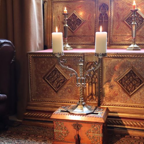 A GOTHIC REVIVAL TWOBRANCH BRASS CANDLESTICK - ADDITIONAL PHOTO 1
