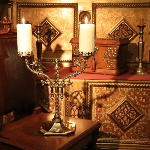 A GOTHIC REVIVAL TWOBRANCH BRASS CANDLESTICK - ADDITIONAL PHOTO 2