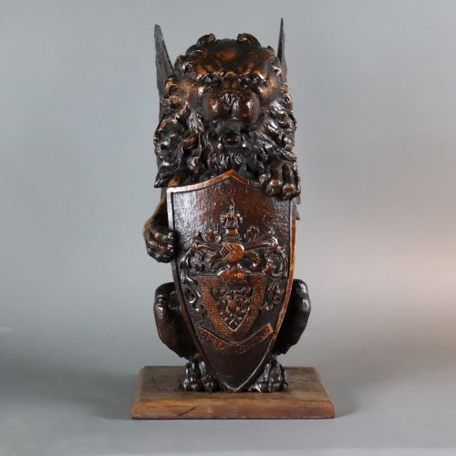 LARGE MID 19TH CENTURY CARVED OAK NEWEL POST OR SIMILAR CAPITAL IN THE FORM OF A WINGED LION HOLDING A SHIELD - ADDITIONAL PHOTO 6