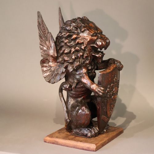 LARGE MID 19TH CENTURY CARVED OAK NEWEL POST OR SIMILAR CAPITAL IN THE FORM OF A WINGED LION HOLDING A SHIELD - ADDITIONAL PHOTO 8