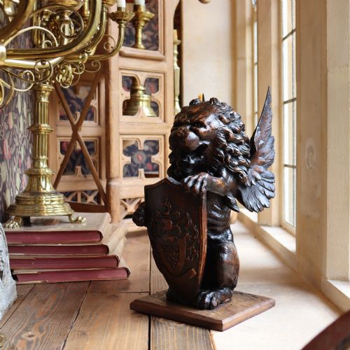 LARGE MID 19TH CENTURY CARVED OAK NEWEL POST OR SIMILAR CAPITAL IN THE FORM OF A WINGED LION HOLDING A SHIELD - ADDITIONAL PHOTO 11