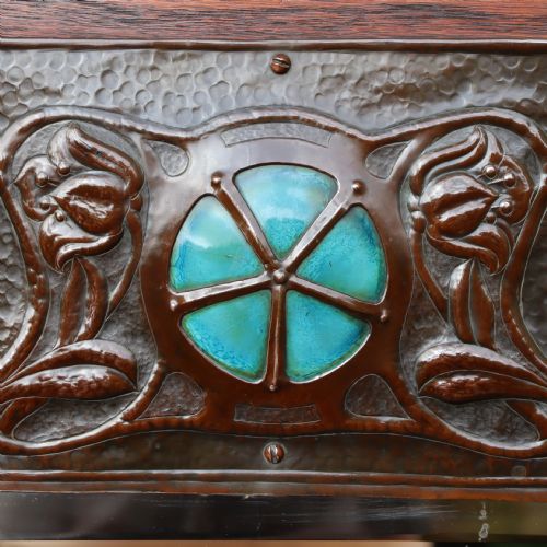 AN ARTS AND CRAFTS REPOUSS AND OAK FRAMED MIRROR - ADDITIONAL PHOTO 3