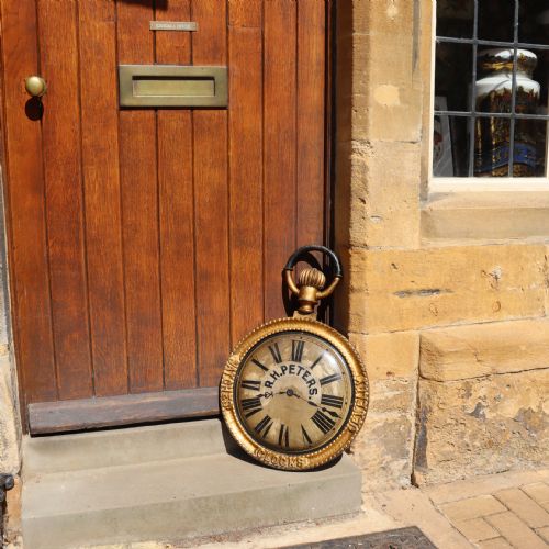 A LATE 19TH CENTURY HANGING TRADE SIGN MODELLED AS A POCKET WATCH - ADDITIONAL PHOTO 4