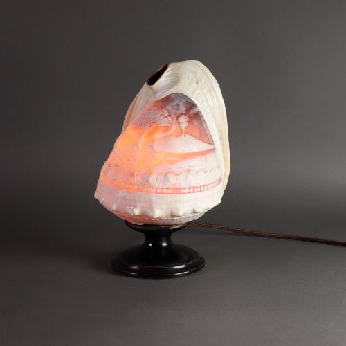 A 19TH CENTURY CONCH SHELL CAMEO TABLE LAMP CARVED WITH THE BAY OF NAPLES WITH VESUVIUS BEHIND IN THE GRAND TOUR MANNER