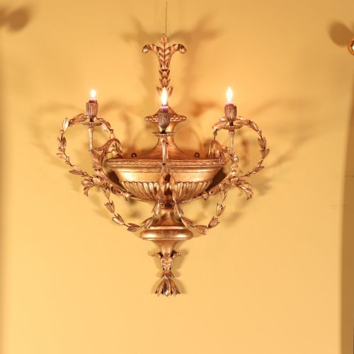 A GEORGE III GILTWOOD AND GESSO THREE BRANCH WALL SCONCE