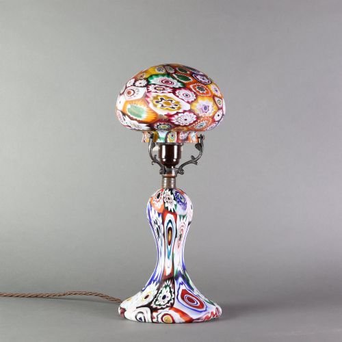 fig 1. An Italian Art Deco millefiori glass table lamp featuring a colourful patterned mushroom shade and matching flared stem base with brass fittings.
