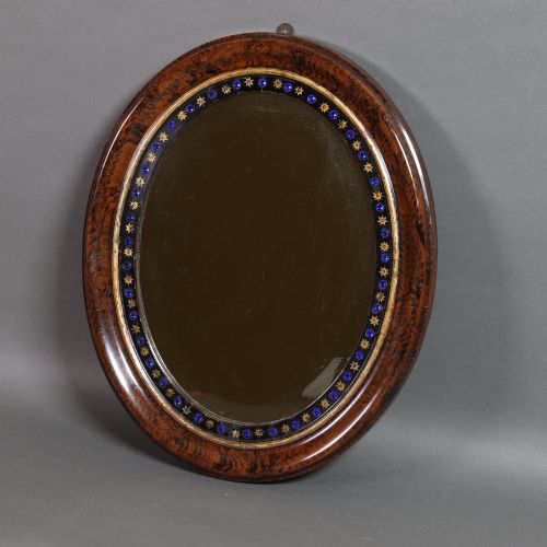 Late 19th Century. Possibly Irish. Highly Decorative and Unusual Oval Wall Mirror.