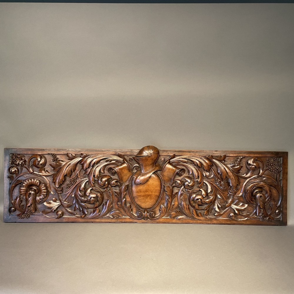 Carved Walnut Panel with Armorial Crest