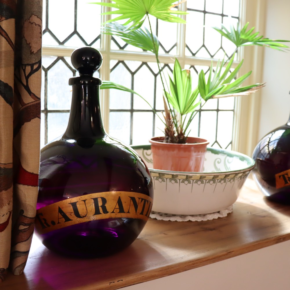 Rare Pair of 19th Century English Amethyst Glass Apothecary bottles View VII