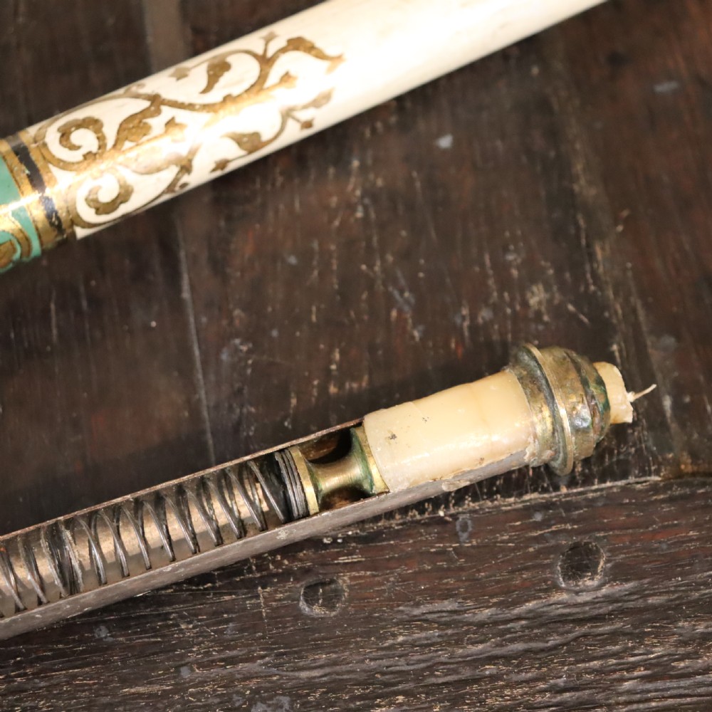 Late 19th Century Pair of Italian spring-loaded Candle holders View V
