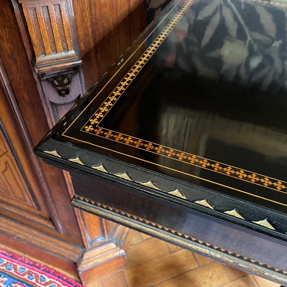An Aesthetic Movement Ebonized and Inlaid Card Table View IV