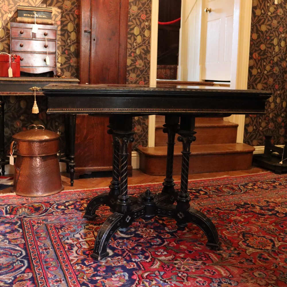 An Aesthetic Movement Ebonized and Inlaid Card Table View V