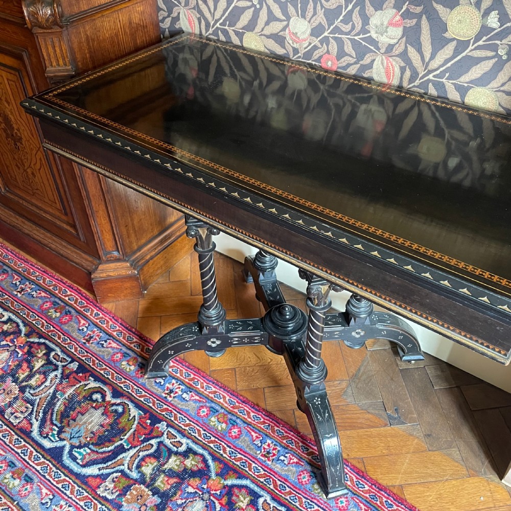 An Aesthetic Movement Ebonized and Inlaid Card Table View VIII