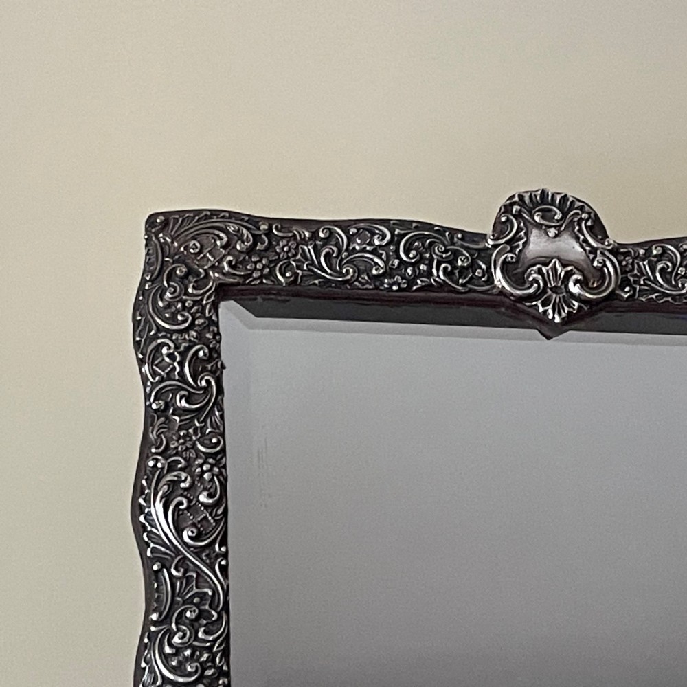 Henry Matthews, a Late Victorian Embossed Silver Framed Dressing Table Mirror  View II