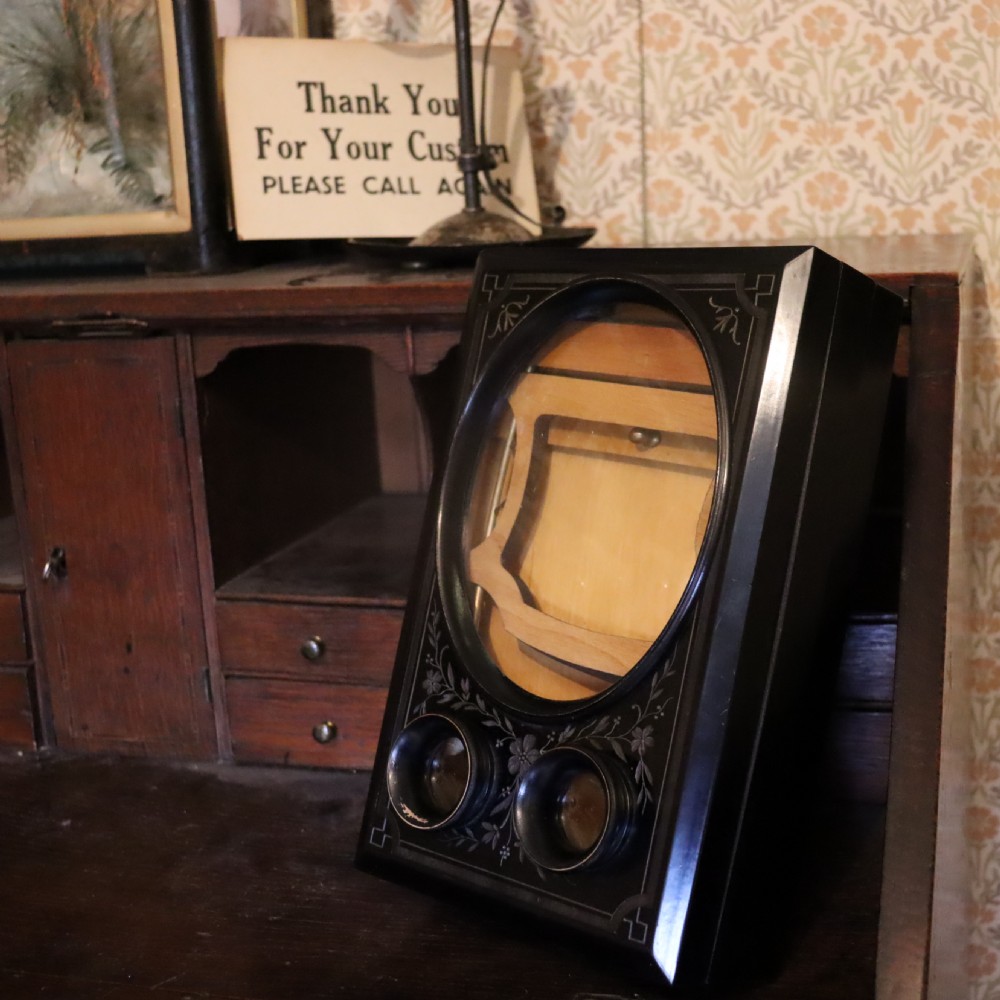 A Victorian Graphoscope or Magnifying device View X