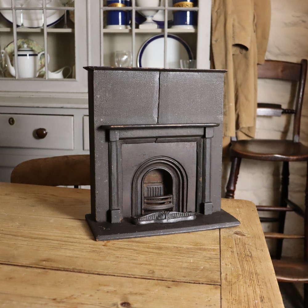 A Victorian salesman’s miniature sample of a cast iron fireplace