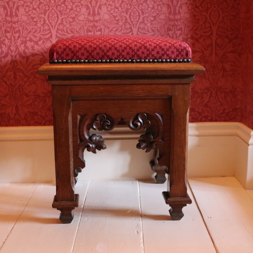 A Victorian Gothic Revival Oak Stool in the manner of Pugin