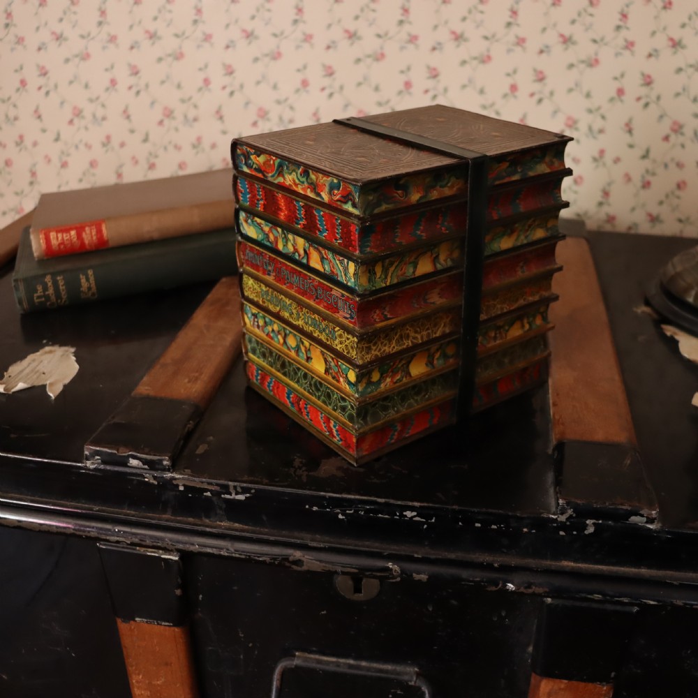 A Huntley & Palmer bundle of books biscuit tin  View V