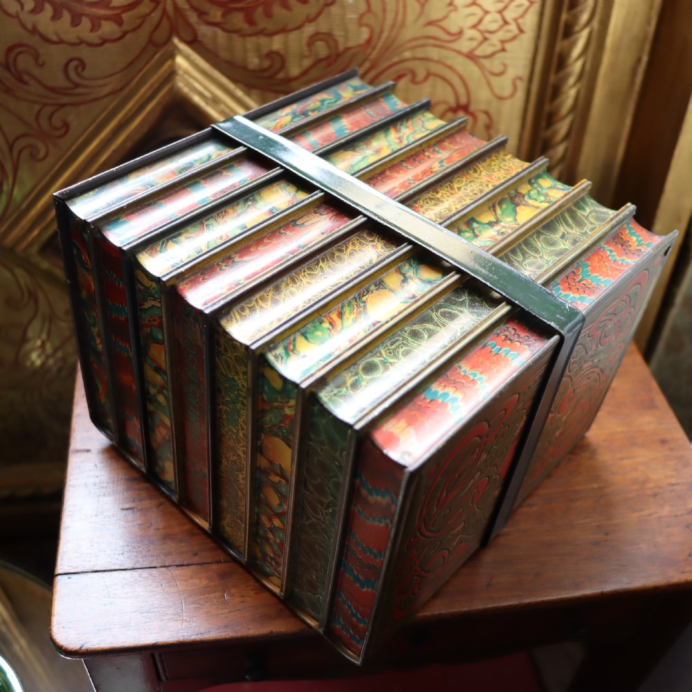 A Huntley & Palmer bundle of books biscuit tin  View VI