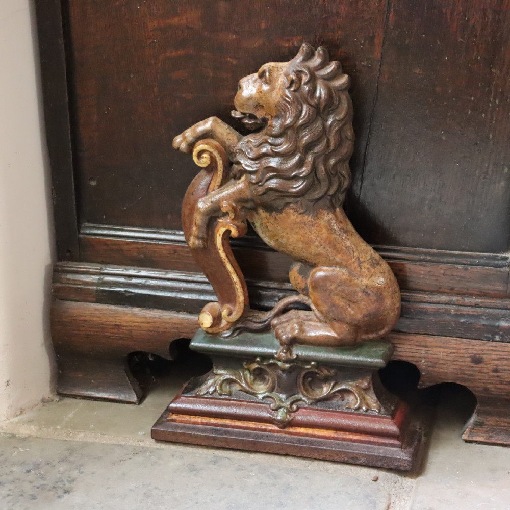 A Victorian cast iron Rampant lion doorstop  View II