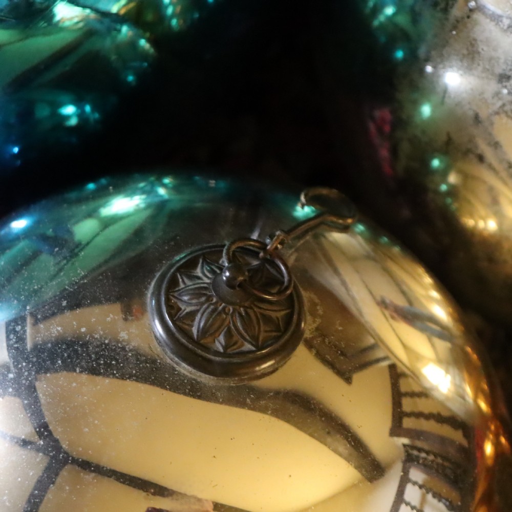 A collection of fifteen antique blown glass witches balls in varying sizes and reflective metallic colours including silver, gold, blue, green, and red. View VII
