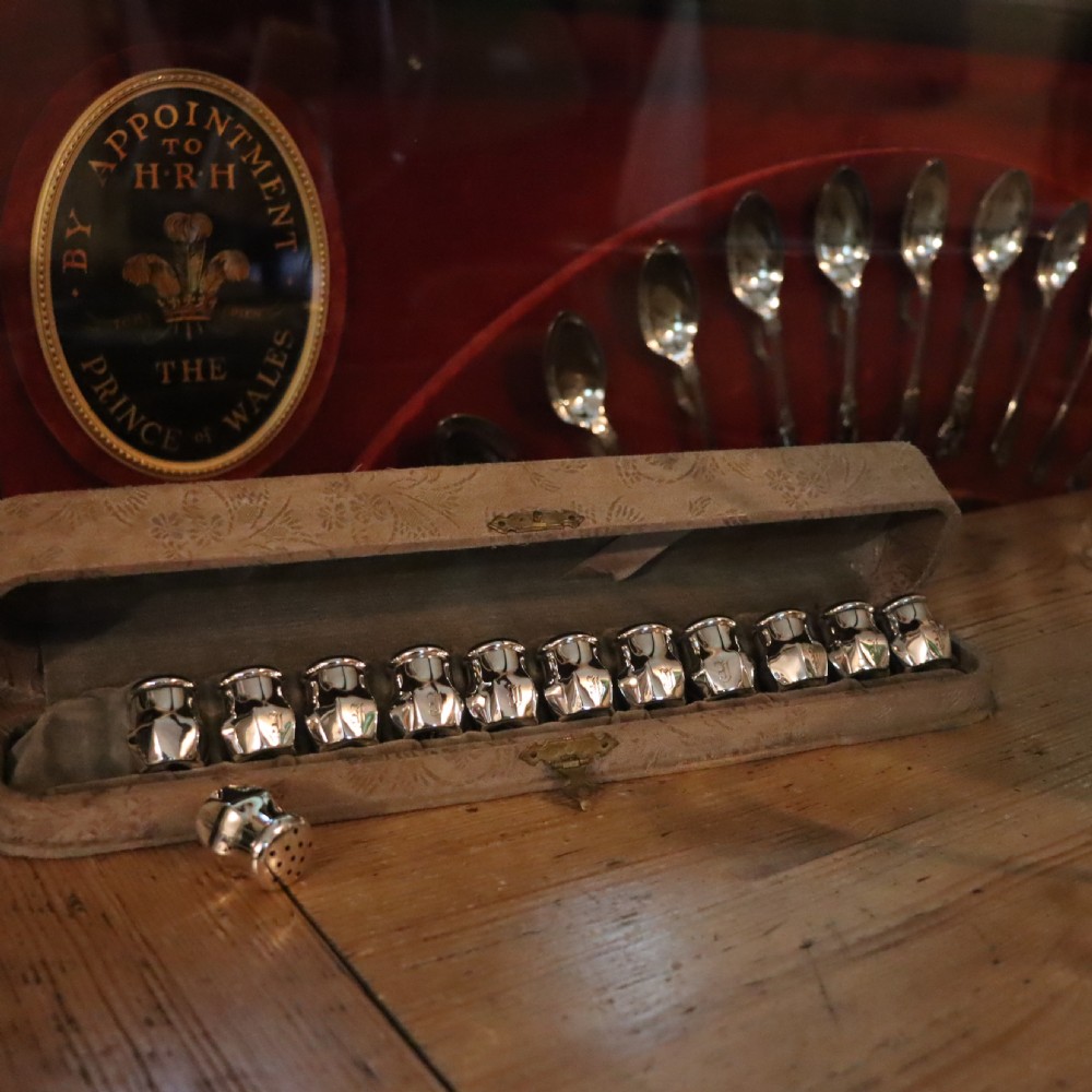 A full set of a dozen Victorian silver Pepperettes  View III