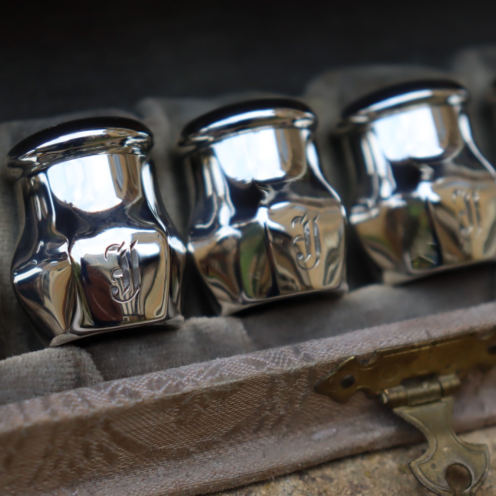 A full set of a dozen Victorian silver Pepperettes  View IV
