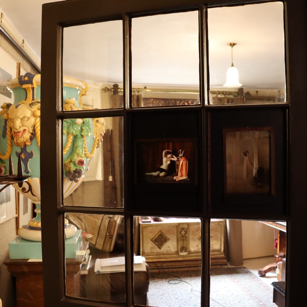A pair of framed early glass autochrome photographs depicting female figures staged in orientalist interior settings. View II