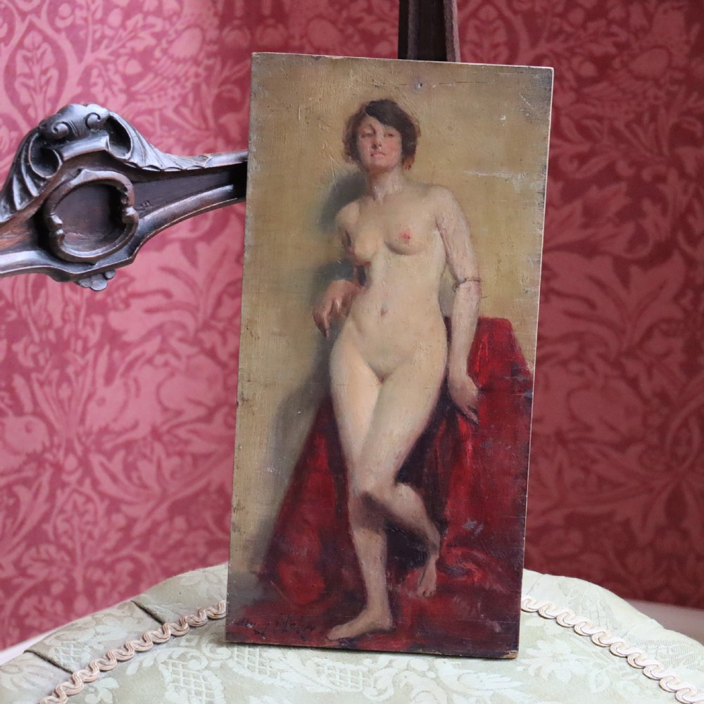A small Henry James Haley signed oil painting on board of a standing nude lady