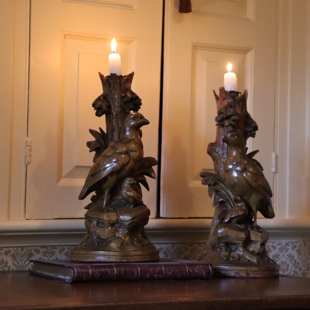A pair of Black Forrest carved limewood candlesticks Circa 1880 View II