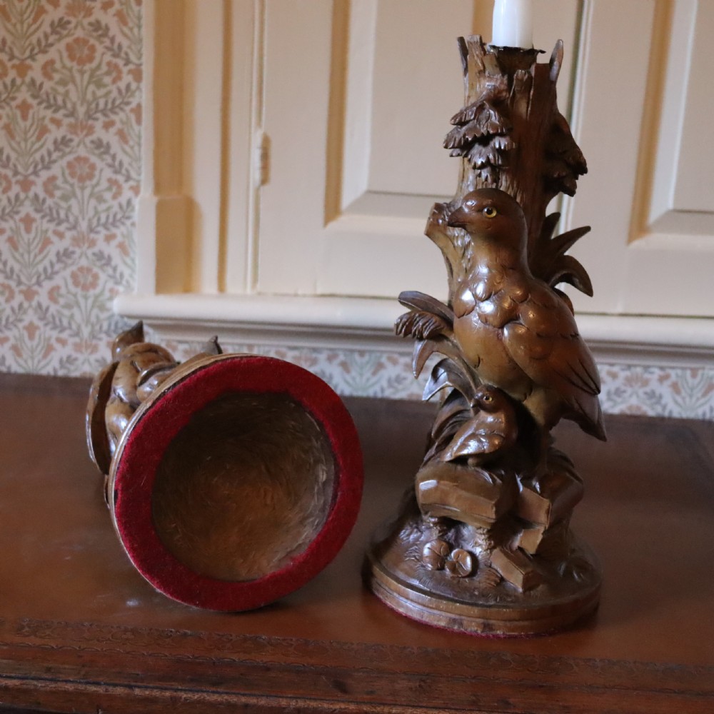 A pair of Black Forrest carved limewood candlesticks Circa 1880 View III