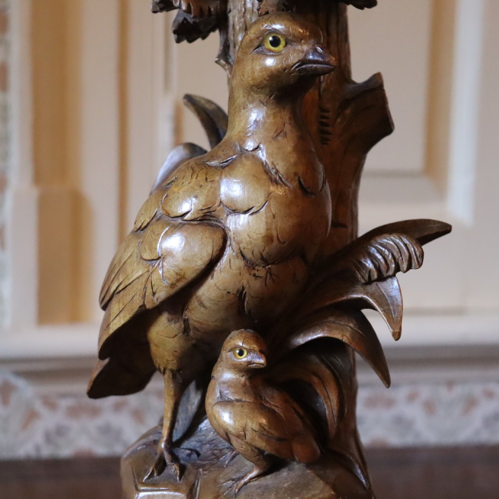 A pair of Black Forrest carved limewood candlesticks Circa 1880 View VI