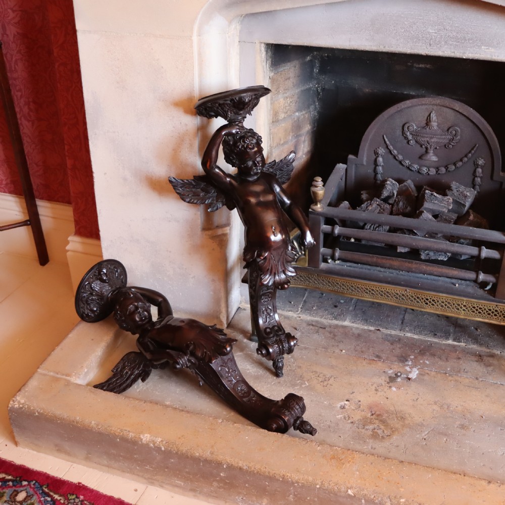 Pair of 19th Century English Limewood winged cherub wall sconces