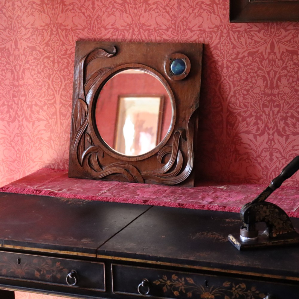 An Arts and Crafts carved wood wall mirror  View IV