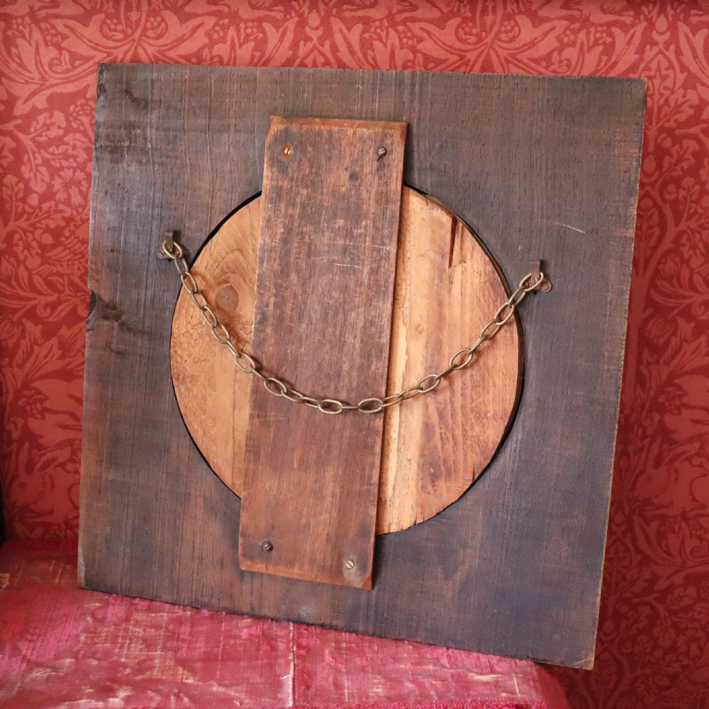 An Arts and Crafts carved wood wall mirror  View X