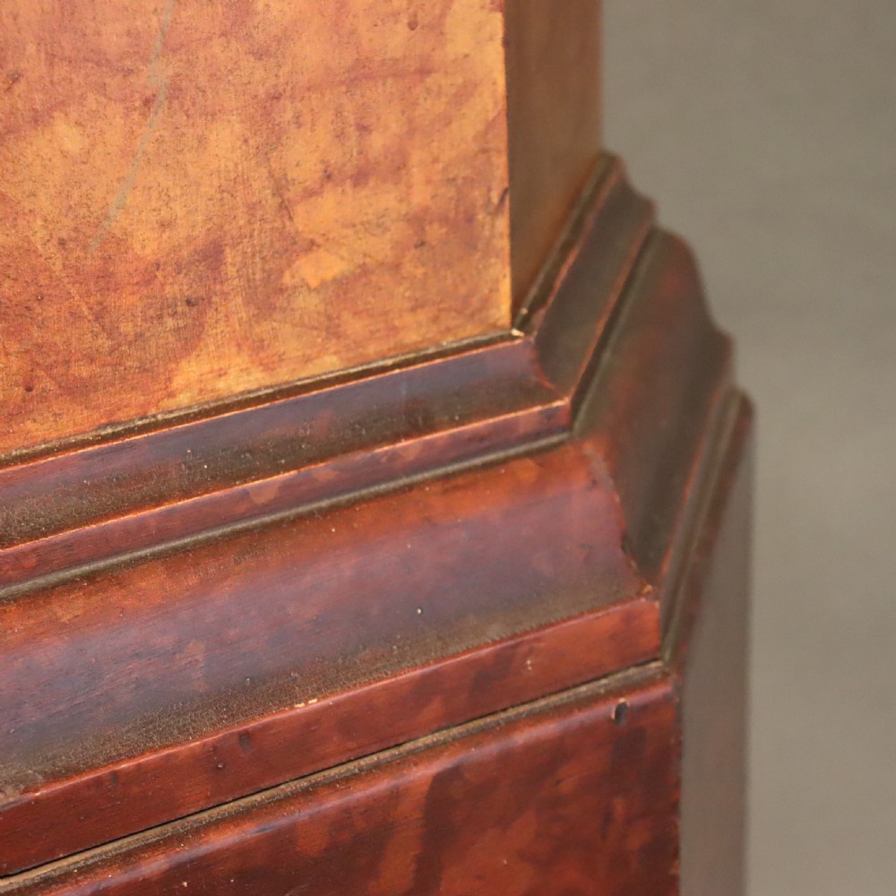 A tall octagonal Victorian column featuring a hand-painted faux marble shaft in warm ochre tones supported by a dark brown octagonal base and capital. View III