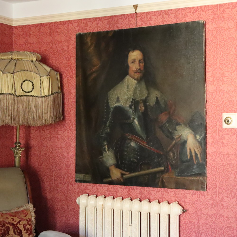 A 19th-century oil portrait depicting a nobleman in dark steel armour with a intricate lace collar holding a command baton, painted after Sir Anthony van Dyck. View II