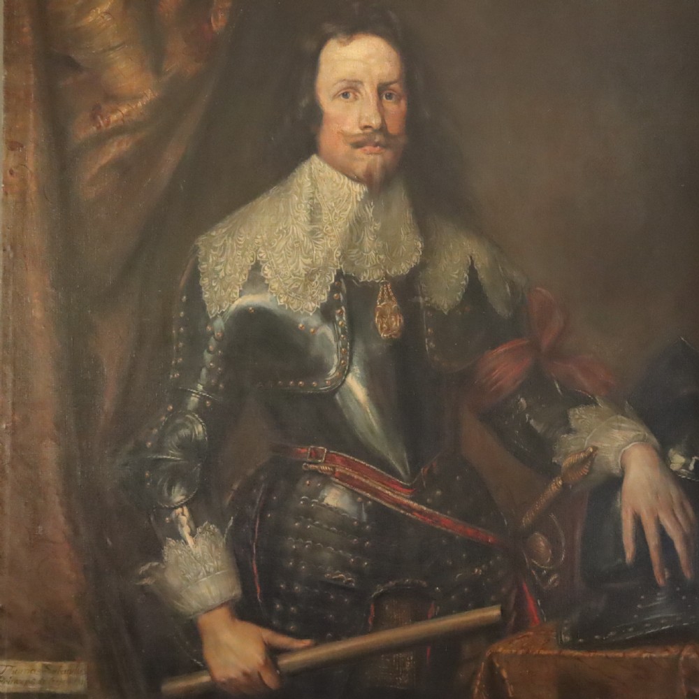 A 19th-century oil portrait depicting a nobleman in dark steel armour with a intricate lace collar holding a command baton, painted after Sir Anthony van Dyck.