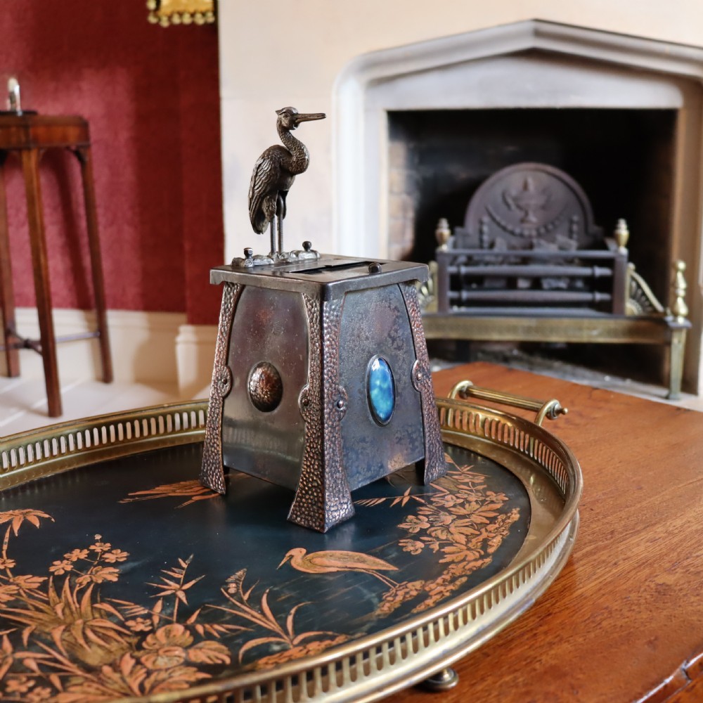 An Arts and Crafts Ruskin set mechanical ‘Stork’ cigarette dispenser View III