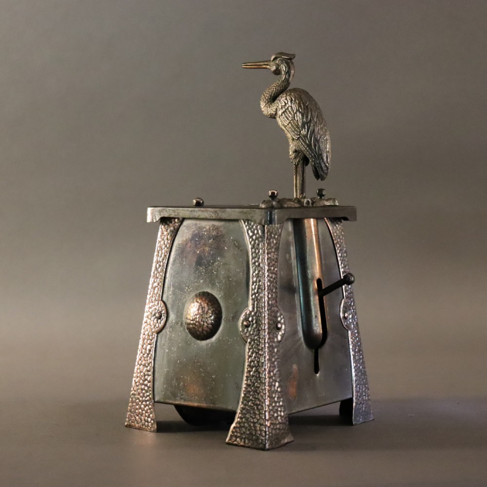 An Arts and Crafts Ruskin set mechanical ‘Stork’ cigarette dispenser View VII