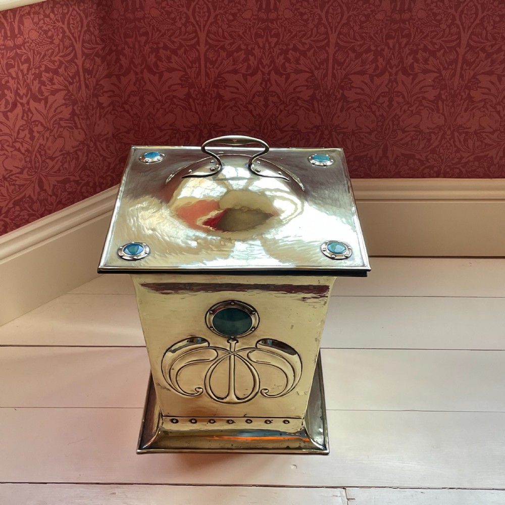An Arts & Crafts Coal Box attributed to Liberty & Co  View II
