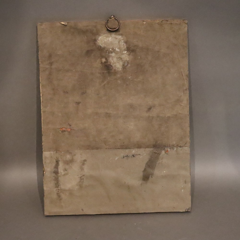 A rectangular hand-hammered copper wall mirror featuring a single blue-green ceramic cabochon mounted at the bottom centre frame. View VII