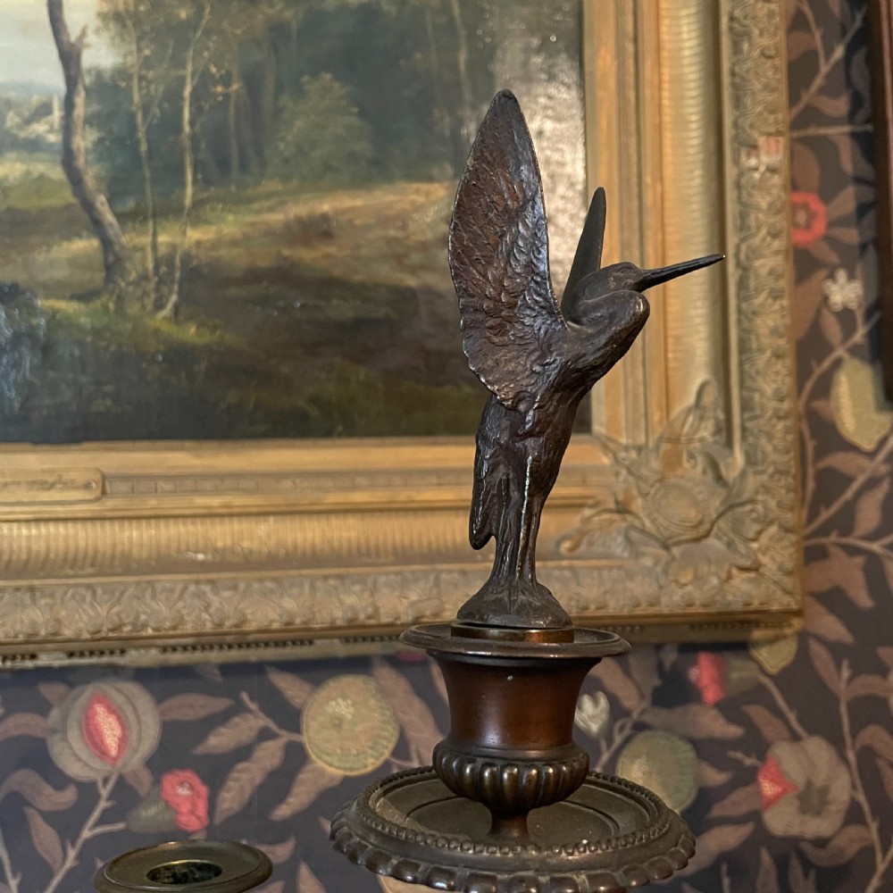 A pair of dark bronze Neoclassical candelabra featuring scrolling branches, bird finials, hanging chains, and black marble bases. View II
