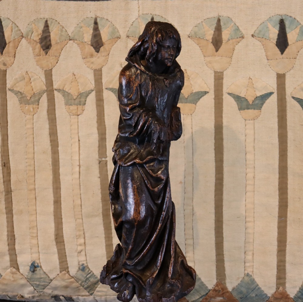 17th Century Carved Oak Figure in hooded cloak 
