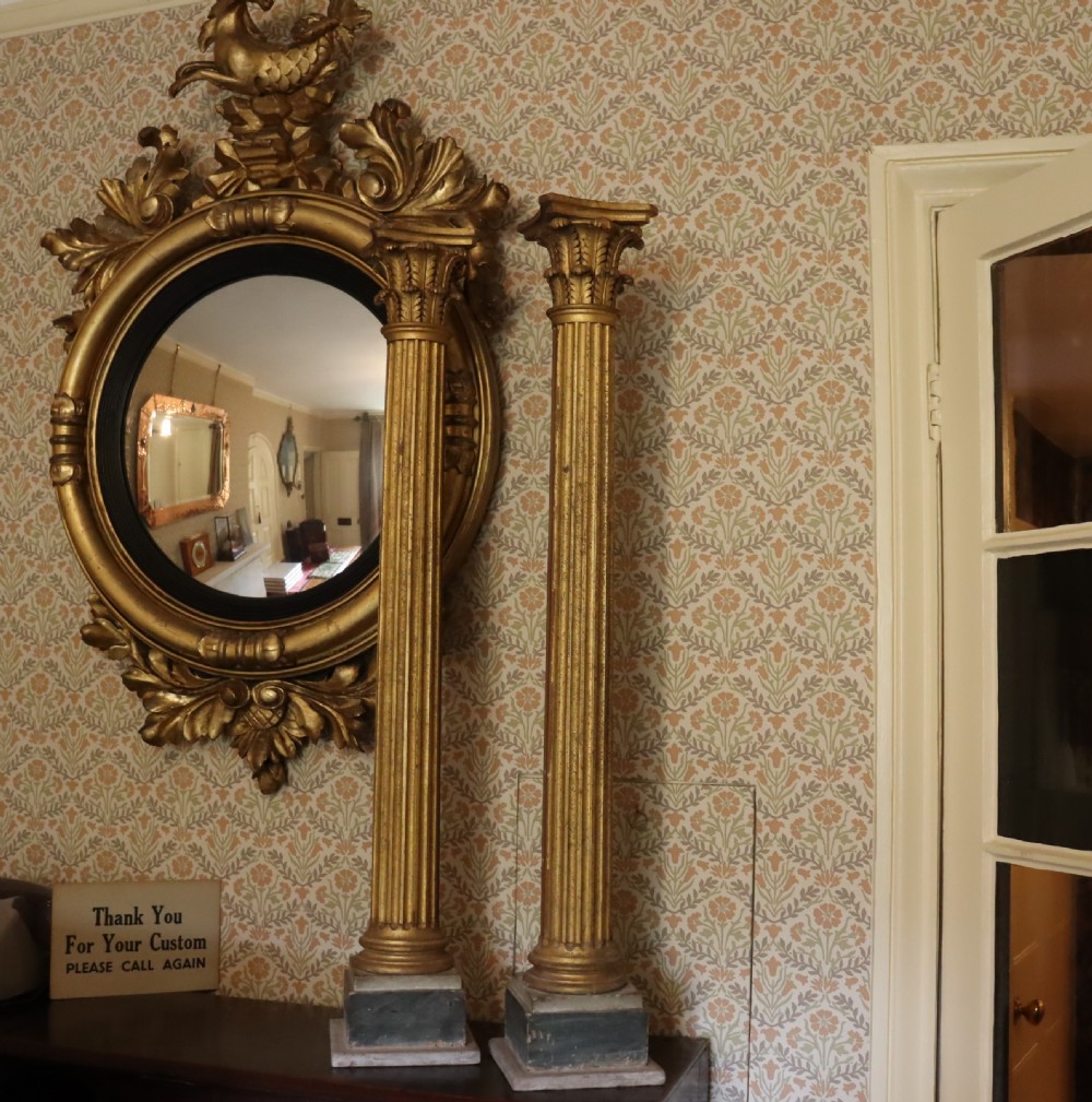 A pair of decorative 19th century carved and gilt wood fluted Corinthian columns