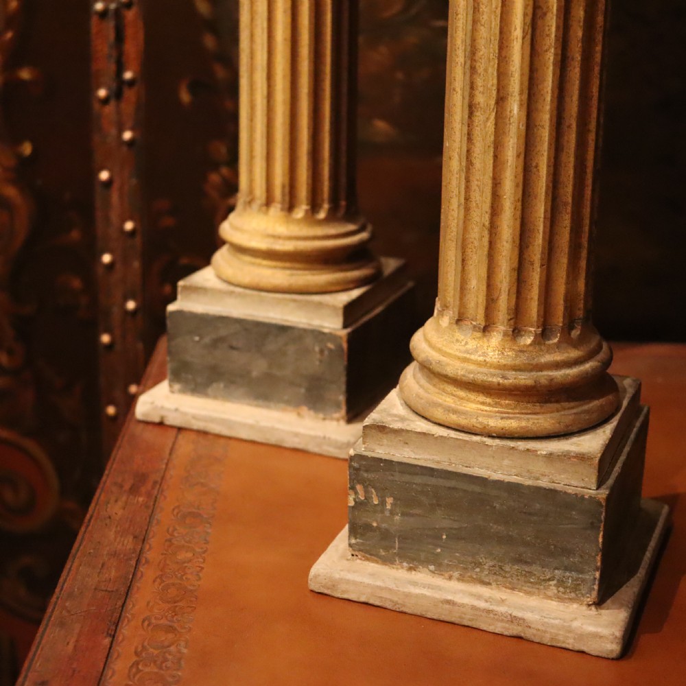 A pair of decorative 19th century carved and gilt wood fluted Corinthian columns View II