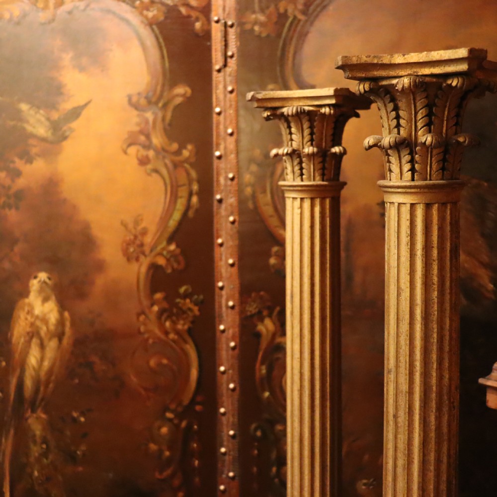 A pair of decorative 19th century carved and gilt wood fluted Corinthian columns View III