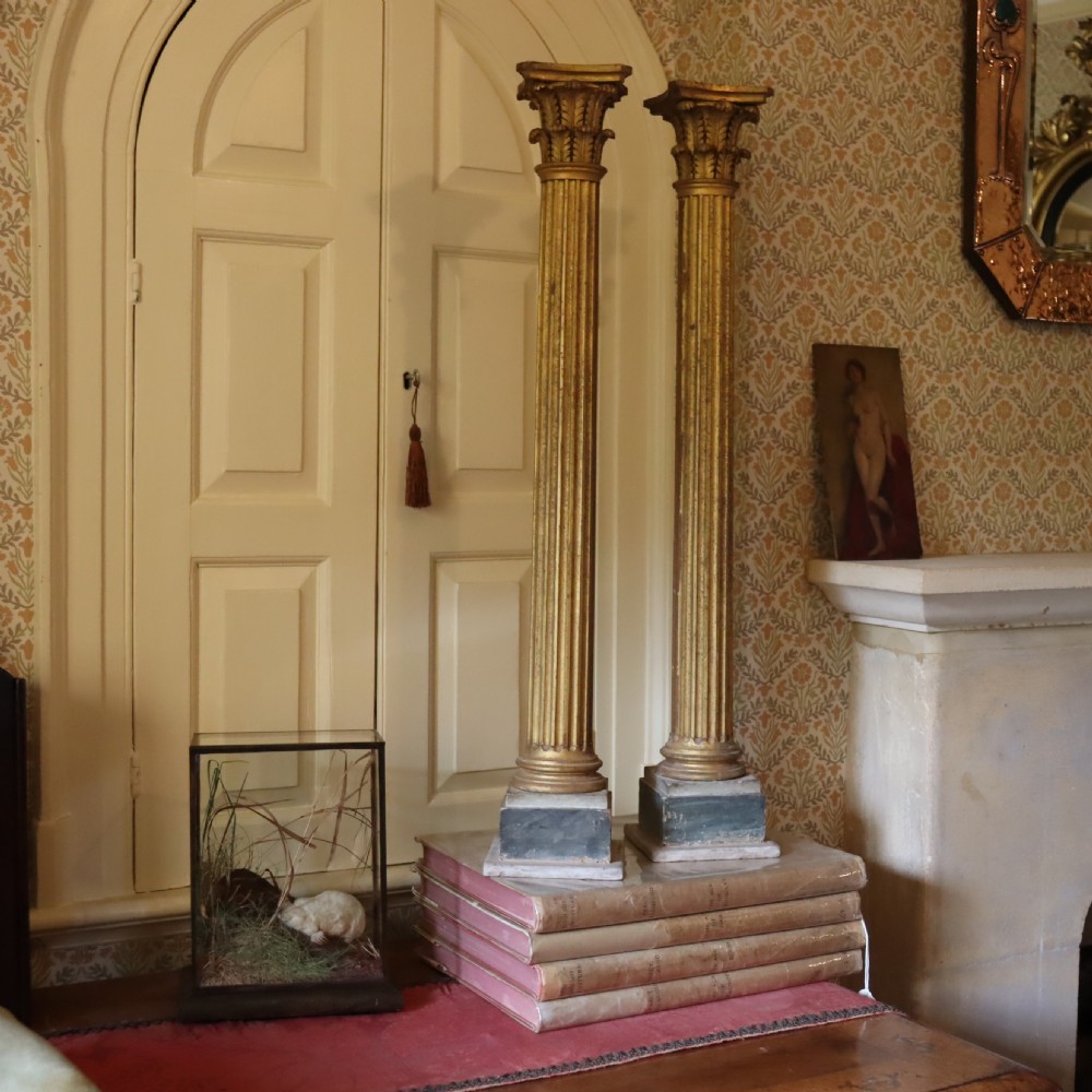 A pair of decorative 19th century carved and gilt wood fluted Corinthian columns View VIII