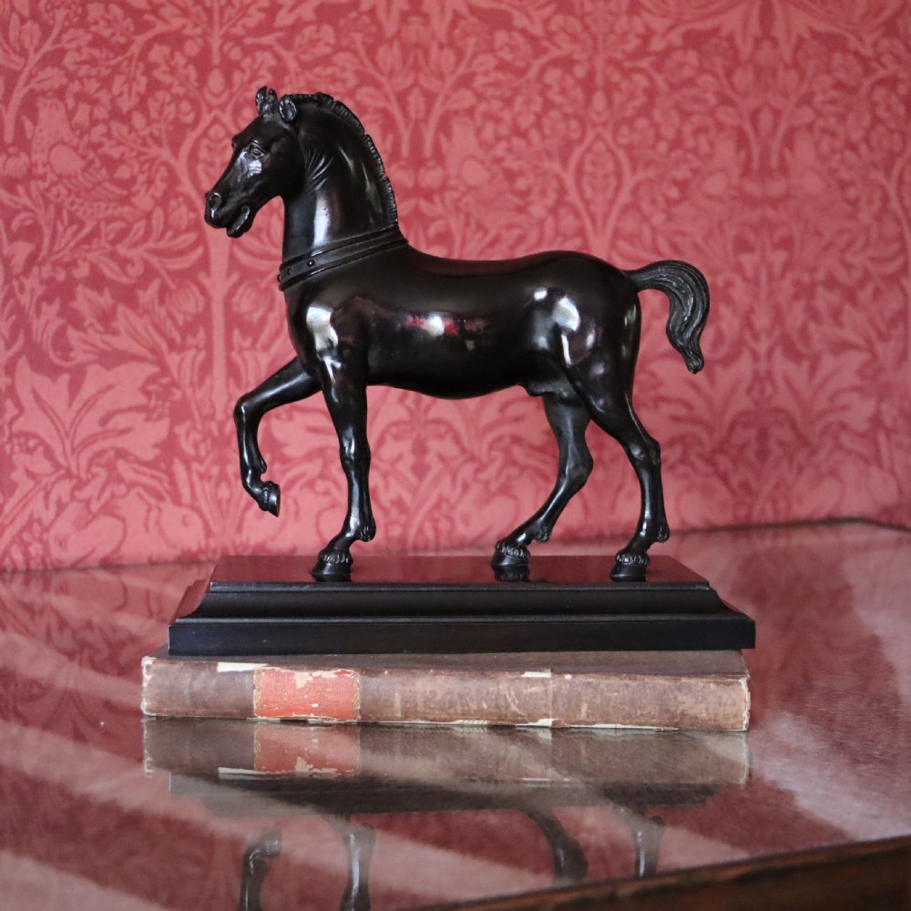 An early 20th century bronze stallion sculpture 
